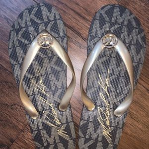 Micheal Kors flip flops